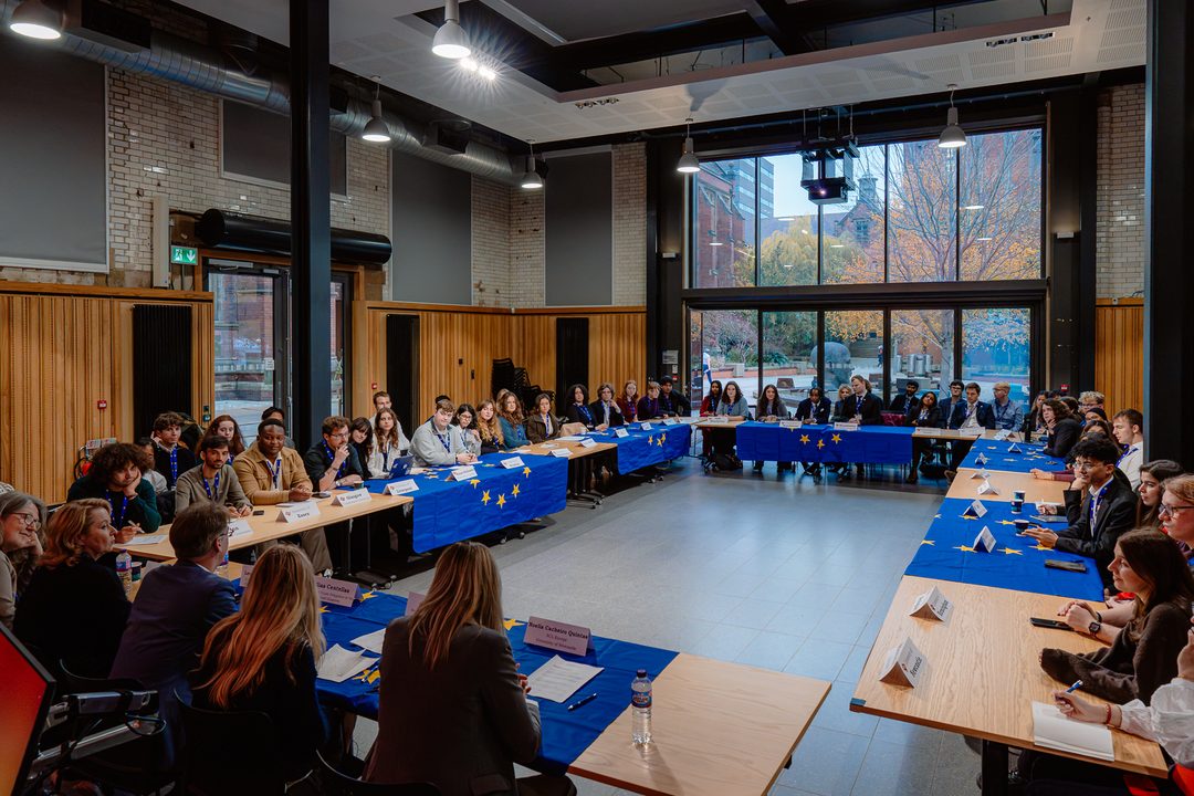 Delegates around the round table at the 2025 Dialogue in Newcastle