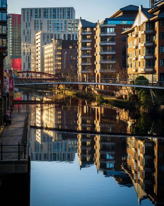 Reflections along a canal in Manchester